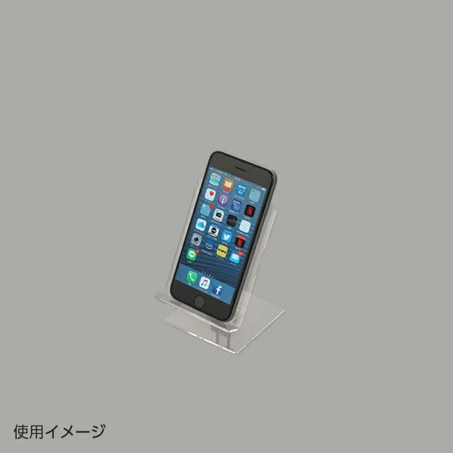 透明展示台モーションST-SS4の使用イメージでスマートフォンが飾られている
